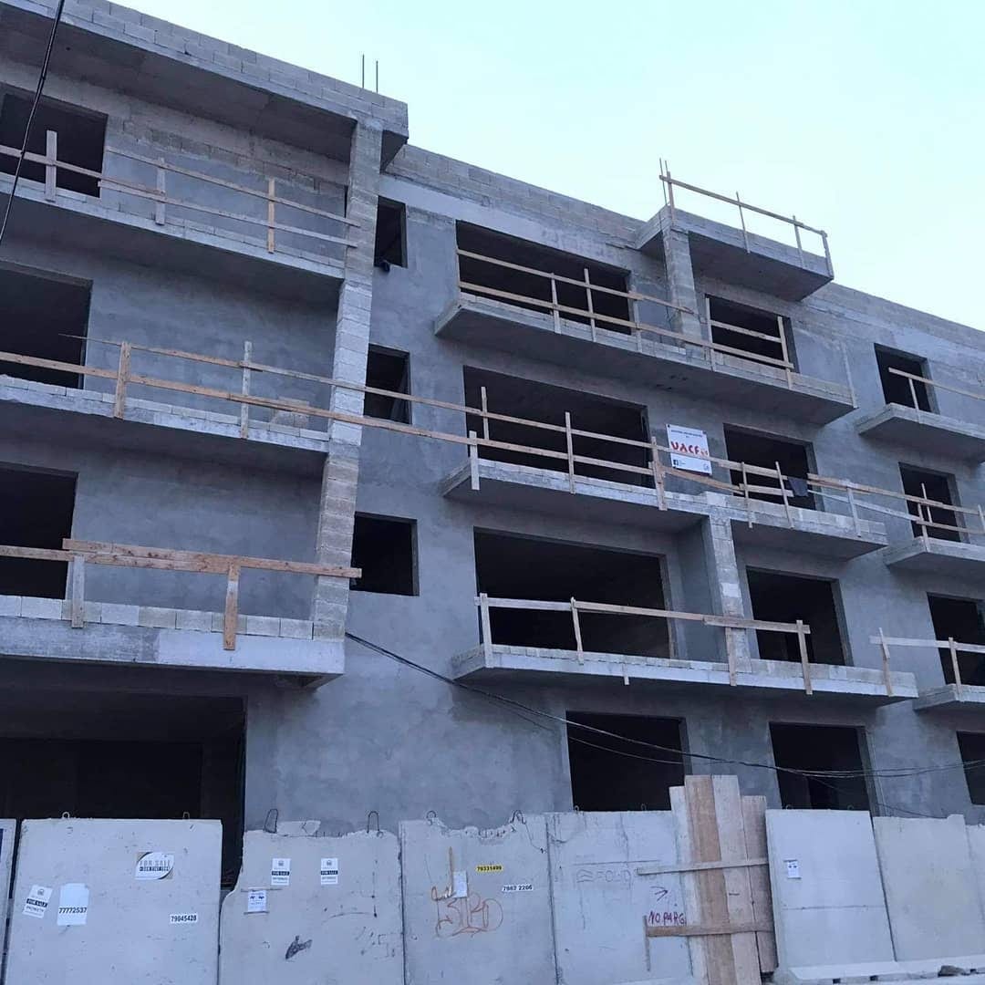 A concrete apartment frame under construction