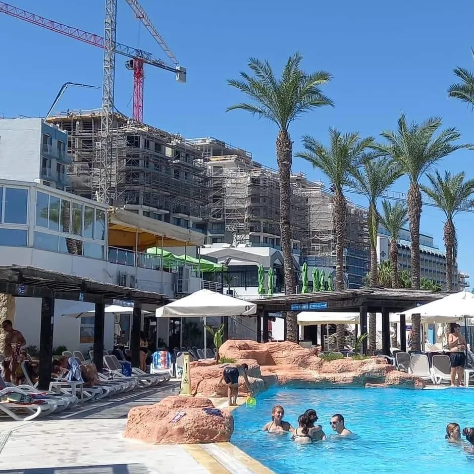 A seaside lido hemmed in by apartment blocks