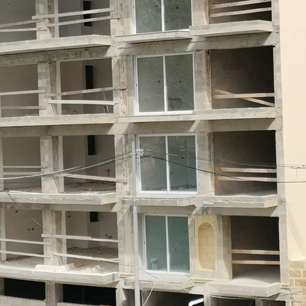 A concrete building skeleton mid-construction